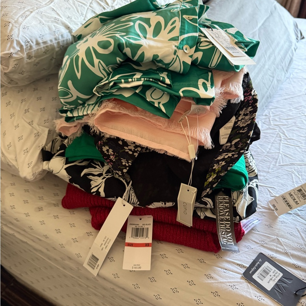 7 different woman’s pieces brand new with tags more like mystery box